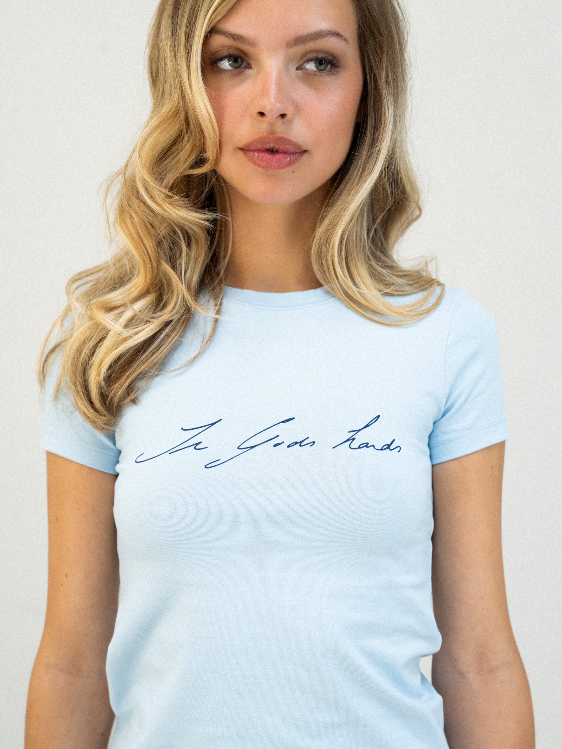 in Gods hands baby tee
